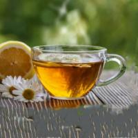 Lemon Zinger Tea · Delicious hot cup of lemon zinger tea freshly brewed.