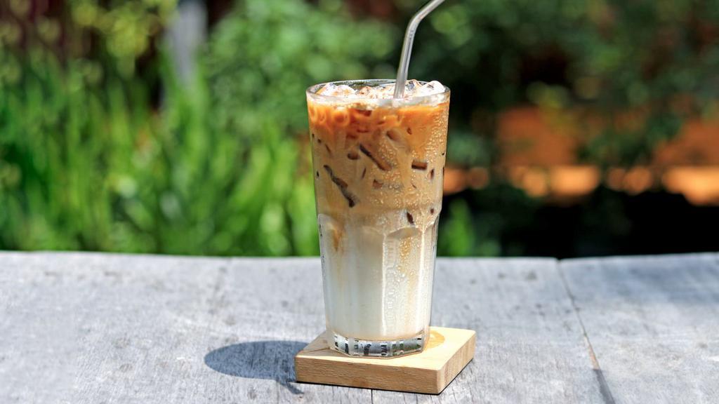 Caramel Flavored Iced Coffee · Delicious caramel flavored iced coffee made with a custom blend of cold-brewed coffee and choice of milk.