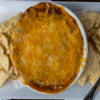 Chili · Slow cooked with fresh ground beef and beans with savory spices in our own kitchen and toppe...