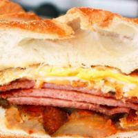 Hash Brown Porkwich · 2 eggs, cheese, Taylor ham  or Bacon & hash brown on your choice of bagel, round roll, or sl...