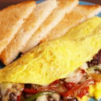 Philly Omelette · With sizzling steak-um, peppers, onions, mushrooms and cheddar cheese.