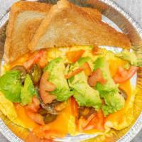 Avocado Omelette · With avocado, tomato, jalapeño and cheddar cheese.