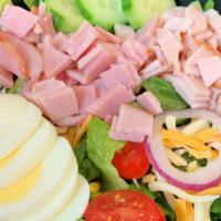 Chef'S Salad · Boiled ham, turkey breast and provolone cheese over our freshly made garden salad.