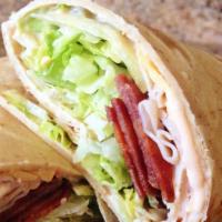 Turkey Club Wrap · Oven gold turkey breast, Swiss cheese, crispy bacon, lettuce, tomatoes and mayo.