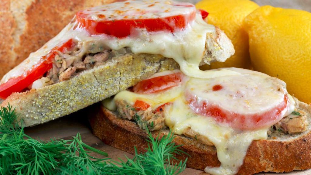 Tuna Melt · Freshly made tuna salad, tomatoes and melted cheese on your choice of toast
