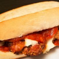 Chicken Parmigiana · Our breaded chicken cutlet topped with tomato sauce and melted fresh mozzarella served on a ...