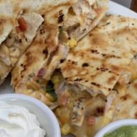 Chicken Quesadilla · Grilled chicken with black beans, corn salsa, shredded cheese, flour tortilla with guacamole...