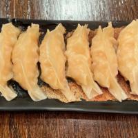 Shrimp Dumpling · Six pieces. Grandpa's traditional shrimp dumpling served with house dumpling sauce.