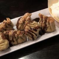 Nutella Dumplings (6 Pieces) · Comes with ice cream.