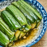 Marinated Cucumber · Cucumber, minced garlic, sesame oil, soy sauce, sweet and sour sauce.