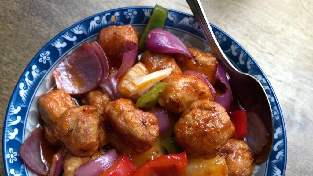 Sweet & Sour Pork With Pineapple · Pork, pineapple, red and green bell pepper, onion.