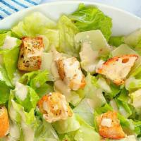 Caesar Salad · Romaine lettuce, garlic croutons, Shaved parmegiano Reggiano, Homemade Caesar dressing