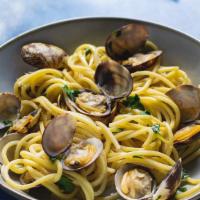 Spaghetti Alla Vongole · Sautéed clams, cherry tomatoes, garlic and parsley.