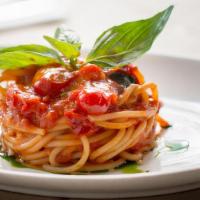 Spaghettoni Al Pomodoro · Artisanal spaghetti from pastificio dei campi, with 