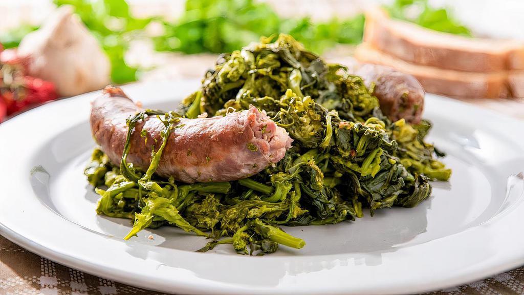 Salsicce E Friarielli · Homemade Italian sausage and sautéed broccoli rabe.