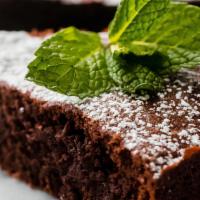 Caprese Cake · Almond and chocolate cake served with vanilla gelato.