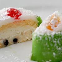 Cassata Siciliana · Traditional Sicilian sponge cake layered with ricotta cheese and covered with a shell of mar...