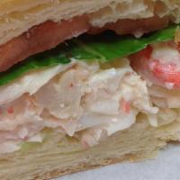 Seafood Salad Sandwich · Sandwich with a seasoned mixed seafood base that is occasionally dressed with mayonnaise.