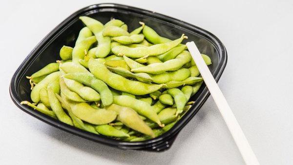 Edamame · Steamed and salted edamame pods.