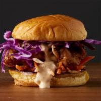 The Smokey Notes  · A tender, juicy chicken sandwich topped with fresh carrots, crunchy red cabbage, and a smoke...