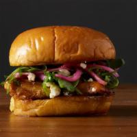 The G.O.A.T. · A tender, juicy chicken sandwich topped with arugula, goat cheese, pickled red onions, and b...