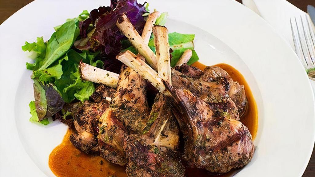 Eight Lamb Chops · Marinated with hand cut herbs. Grilled and served with our Signature Brown Sauce. Served with choice of side and a small Salad.