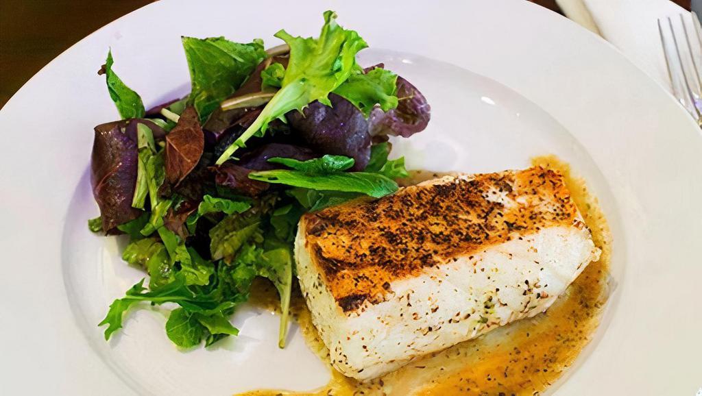 Baked Chilean Sea Bass Filet · 8 oz. Wild Caught Chilean Sea Bass cooked In a light white wine sauce. Served with one choice of side and salad.
