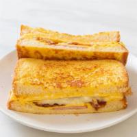 2 Eggs With Meat And Cheese · Your choice of bread, egg preparation, breakfast meat and cheese.
