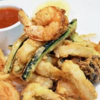 Fritto Misto · Liguria. Fried shrimp, calamari and zucchini with marinara sauce.