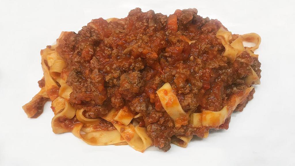 Tagliatelle Alla Bolognese · Emilia romagna. Tagliatelle with beef bolognese sauce.