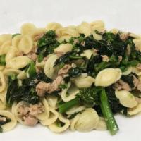 Orecchiette Rapini E Salsicce · Puglia. Ear-shaped pasta, italian sausage, and broccoli di rapa tossed in garlic and olive o...