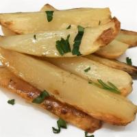 Patate Al Forno · Country roasted potatoes.