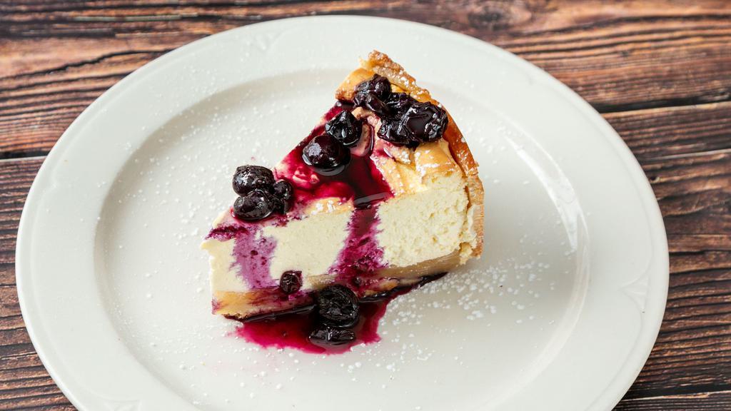 Torta Di Ricotta E Pere · Emilia romagna. Pear ricotta cheesecake with blueberry compote.