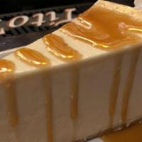 Ny Style Cheesecake · Creamy NY Style cheesecake w caramel drizzle and whipped cream!