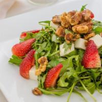 Strawberry Salad · Baby arugula, strawberries, candied walnuts, Mozzarella, balsamic vinaigrette.