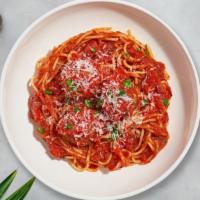 Spaghetti Meatierites  · Fresh spaghetti pasta cooked in tomato sauce topped with meatballs, black pepper, parsley, a...