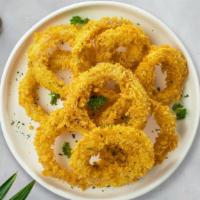 Lord Of The Onion Rings · (Vegetarian) Sliced onions dipped in a light batter and fried until crispy and golden brown.