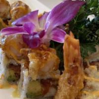 Angry Dragon Roll · king crab, spicy tuna, avocado inside topped with 2 shrimp tempura, eel sauce, spicy mayo, a...