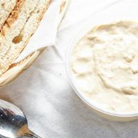 Hummus · Chickpeas mashed in to paste, mixed with tahini, a touch of garlic and olive oil.
