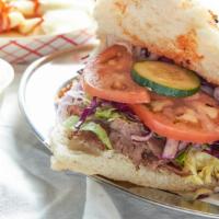 Beef/Lamb Gyro With Homemade Bread · comes with lettuce, tomato, cucumber, red cabbage, white and hot sauce