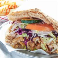 Chicken Gyro With Homemade Bread · comes with lettuce, tomato, cucumber, red cabbage, white and hot sauce