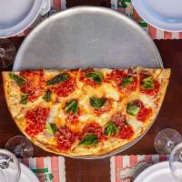 Fresh Mozzarella  Pizza · Tomatoes, fresh basil and fresh Mozzarella.