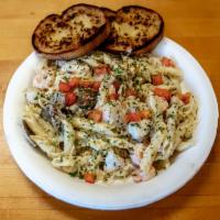South Maui Seafood Pasta · Sautéed shrimp, scallops, fresh fish and clams in a garlic cream sauce and served with garli...