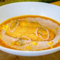 Fish & Grits · Delicious baked fish with fresh cornmeal.