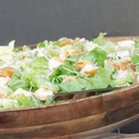 Caesar Salad · Romaine lettuce with homemade croutons and parmesan cheese.