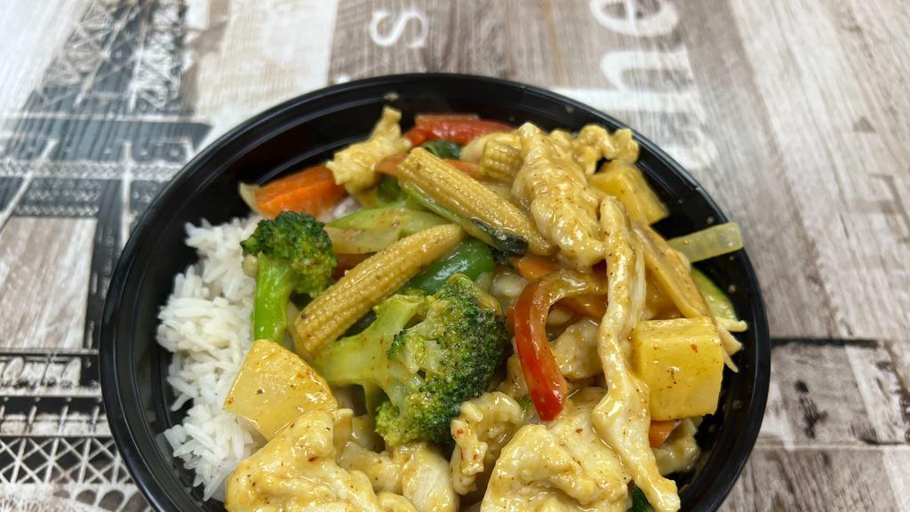 Coconut Curry Bowl · Broccoli, carrots, bell peppers, green beans and onions simmered in a curry made w. Thai spices, coconut milk & basil