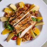 Waldorf Chicken · Mixed greens with grilled chicken, walnuts, grapes and apples, with raspberry vinaigrette.