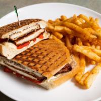 Italiano Panini · Grilled chicken, roasted peppers and fresh mozzarella cheese, served with a side of balsamic...