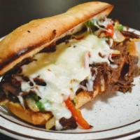 Philly Cheese Steak · Mushrooms, peppers, and onions and provolone cheese.