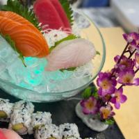 Sushi & Sashimi Lunch · Four piece sushi, six piece sashimi and California roll.